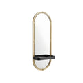 "Elegant Oval Mirror with Shelving: Modern Design and Gold Accents"
